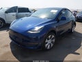 2023 Tesla Model Y — photo 2 of 18 | VIN 7SAYGDEE7PA126281