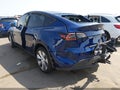 2023 Tesla Model Y — photo 3 of 18 | VIN 7SAYGDEE7PA126281