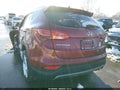 2016 Hyundai Santa Fe — photo 3 of 15 | VIN 5XYZU3LB4GG311378