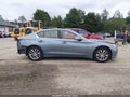 2014 Infiniti Q50 — photo 13 of 16 | VIN JN1BV7AR9EM694660