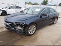 2021 Chevrolet Malibu — photo 2 of 16 | VIN 1G1ZD5ST8MF014143