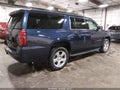 2019 Chevrolet Suburban — photo 4 of 18 | VIN 1GNSKHKC1KR138211