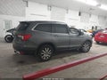2020 Honda Pilot — photo 14 of 17 | VIN 5FNYF6H51LB015178