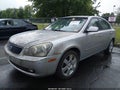 2007 Kia Optima — photo 2 of 11 | VIN KNAGE123275119658