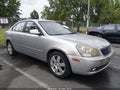 2007 Kia Optima — photo 6 of 11 | VIN KNAGE123275119658