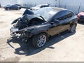 2023 Tesla Model Y — photo 2 of 18 | VIN 7SAYGDEF6PF714457