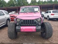 2012 Jeep Wrangler Unlimited — photo 12 of 16 | VIN 1C4HJWDG0CL259360