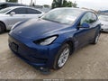 2020 Tesla Model Y — photo 2 of 18 | VIN 5YJYGDEE7LF031066