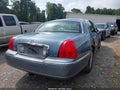 2004 Lincoln Town Car — photo 4 of 11 | VIN 1LNHM81W54Y663298