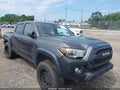 2018 Toyota Tacoma — photo 1 of 16 | VIN 3TMCZ5AN3JM186111