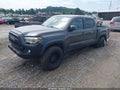 2018 Toyota Tacoma — photo 2 of 16 | VIN 3TMCZ5AN3JM186111