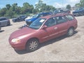 2000 Hyundai Elantra — photo 2 of 16 | VIN KMHJW35F2YU165565
