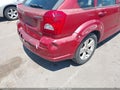 2010 Dodge Caliber — photo 14 of 17 | VIN 1B3CB4HA2AD661651