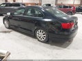 2014 Volkswagen Jetta — photo 3 of 14 | VIN 3VWB17AJ2EM432838