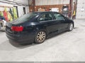 2014 Volkswagen Jetta — photo 4 of 14 | VIN 3VWB17AJ2EM432838