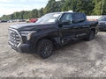 2023 Toyota Tundra — photo 2 of 18 | VIN 5TFNA5DB9PX128959