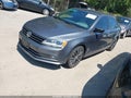 2016 Volkswagen Jetta — photo 2 of 17 | VIN 3VWD17AJ6GM252693