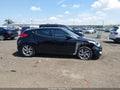 2017 Hyundai Veloster — photo 13 of 16 | VIN KMHTC6AD7HU306475