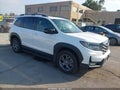 2024 Honda Passport — photo 1 of 16 | VIN 5FNYF8H62RB005904
