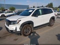 2024 Honda Passport — photo 2 of 16 | VIN 5FNYF8H62RB005904