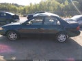 1999 Chevrolet Prizm — photo 14 of 16 | VIN 1Y1SK5280XZ403318