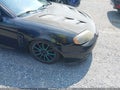 2005 Hyundai Tiburon — photo 6 of 17 | VIN KMHHN65FX5U158071