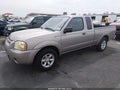 2004 Nissan Frontier — photo 2 of 11 | VIN 1N6DD26TX4C459086