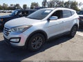 2014 Hyundai Santa Fe — photo 2 of 16 | VIN 5XYZU3LB8EG187743