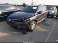 2016 Volkswagen Tiguan — photo 2 of 16 | VIN WVGBV7AX6GW599522