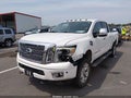 2016 Nissan Titan — photo 4 of 13 | VIN 1N6AA1F45GN510274