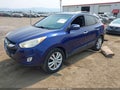 2011 Hyundai Tucson — photo 2 of 22 | VIN KM8JUCAC6BU198948