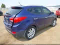 2011 Hyundai Tucson — photo 4 of 22 | VIN KM8JUCAC6BU198948