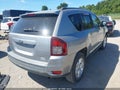 2014 Jeep Compass — photo 4 of 12 | VIN 1C4NJCBA5ED774433