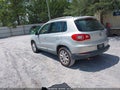 2009 Volkswagen Tiguan — photo 3 of 11 | VIN WVGAV75N59W005431