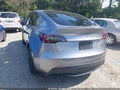 2024 Tesla Model Y — photo 3 of 14 | VIN 7SAYGDEE7RA302877