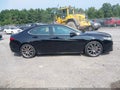 2016 Acura TLX — photo 13 of 16 | VIN 19UUB3F5XGA002599