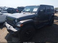 2022 Jeep Wrangler Unlimited — photo 2 of 17 | VIN 1C4HJXDG5NW165207
