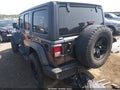 2022 Jeep Wrangler Unlimited — photo 3 of 17 | VIN 1C4HJXDG5NW165207