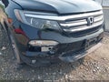 2016 Honda Pilot — photo 6 of 16 | VIN 5FNYF6H53GB005340