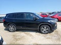 2018 Honda Pilot — photo 13 of 16 | VIN 5FNYF6H35JB073371