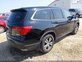 2018 Honda Pilot — photo 4 of 16 | VIN 5FNYF6H35JB073371