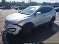 2015 Hyundai Santa Fe — photo 2 of 16 | VIN 5XYZU3LB7FG270274
