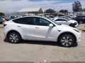 2022 Tesla Model Y — photo 13 of 19 | VIN 7SAYGAEE9NF314881
