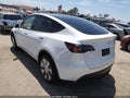 2022 Tesla Model Y — photo 3 of 19 | VIN 7SAYGAEE9NF314881