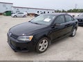 2014 Volkswagen Jetta — photo 2 of 11 | VIN 3VWLL7AJ6EM222628