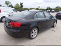 2014 Volkswagen Jetta — photo 4 of 11 | VIN 3VWLL7AJ6EM222628