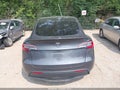 2021 Tesla Model Y — photo 16 of 18 | VIN 5YJYGDEF0MF081740
