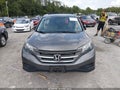 2014 Honda CR-V — photo 12 of 16 | VIN 2HKRM4H39EH620213