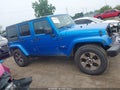 2016 Jeep Wrangler Unlimited — photo 13 of 17 | VIN 1C4BJWEG6GL262144