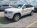 2012 Jeep Grand Cherokee — photo 2 of 17 | VIN 1C4RJFAG8CC189616